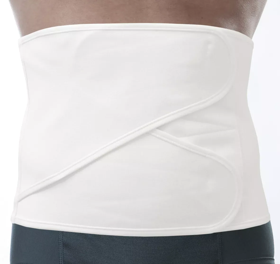 A model wearing an abdominal support belt/wrap
