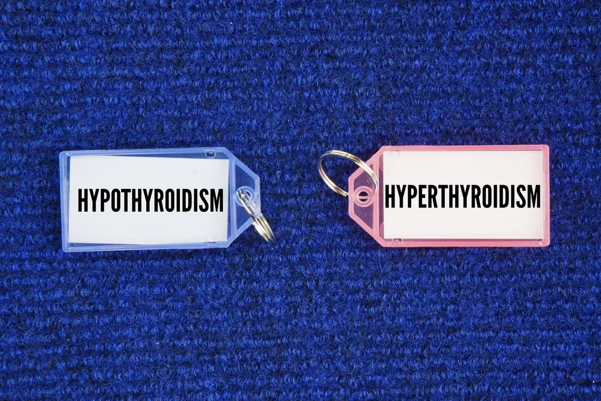 Two key tags on a blue background, labelled Hypothyroidism and Hyperthyroidism